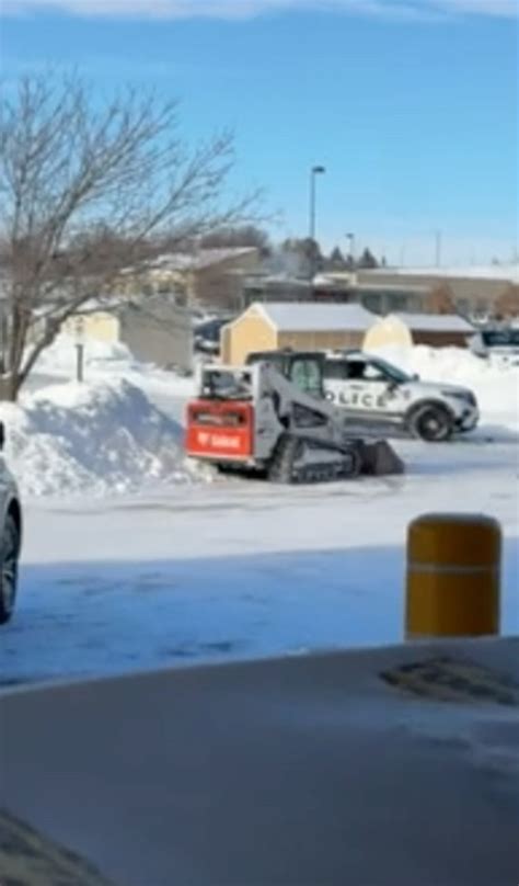 skid steer hits police car|Samuel Peyrot arrested after skid loader rampage .